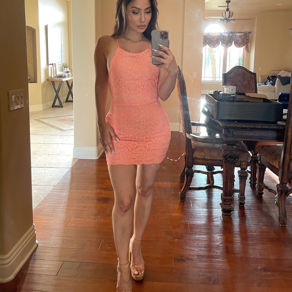 Orange lace mini dress with criss cross back size small